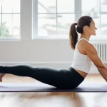 필라테스 강사와 자세 교정 이론 - **Prompt:** A fit woman in her late 30s, wearing modest yet comfortable sportswear (full-length legg...